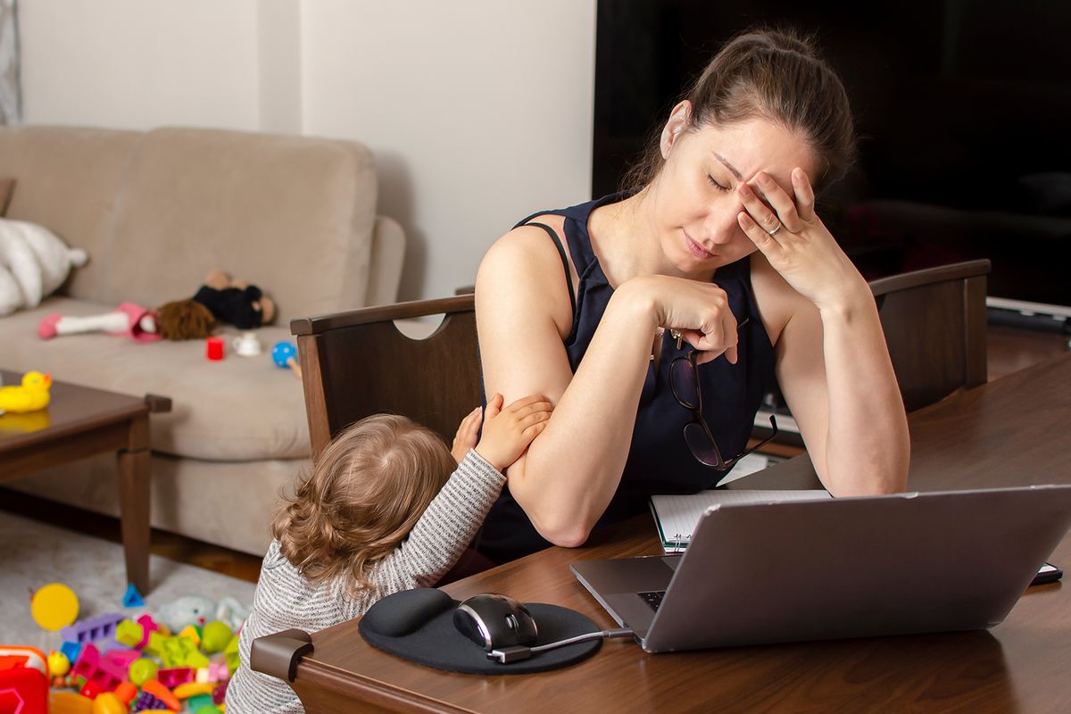 Tired,Mother,Trying,To,Work,On,A,Laptop,At,Home
Tired mother trying to work on a laptop at home during her kid crying. Childcare and working mom concept. Women powerful. Toddler tantrum. Young lady working at home during quarantine.
