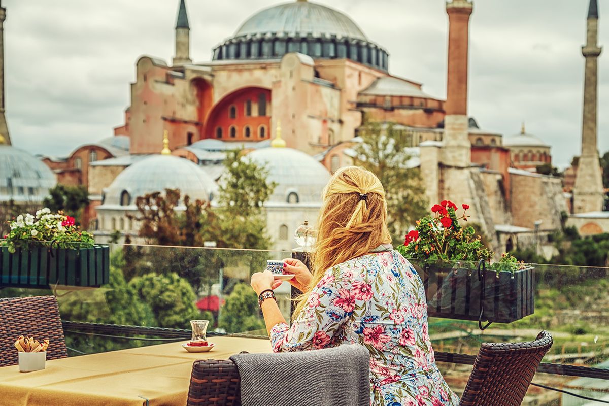 Girl,Drinks,Turkish,Coffee,Enjoying,The,View,Of,The,Hagia