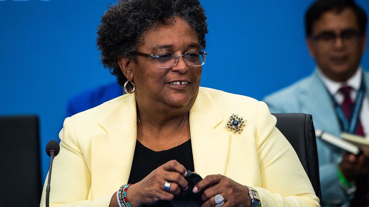 Prime Minister of Barbados, Mia Mottley (R) arrives to attend the New Global Financial Pact Summit at the Palais Brongniart in Paris on June 22, 2023. (Photo by LUDOVIC MARIN / POOL / AFP)