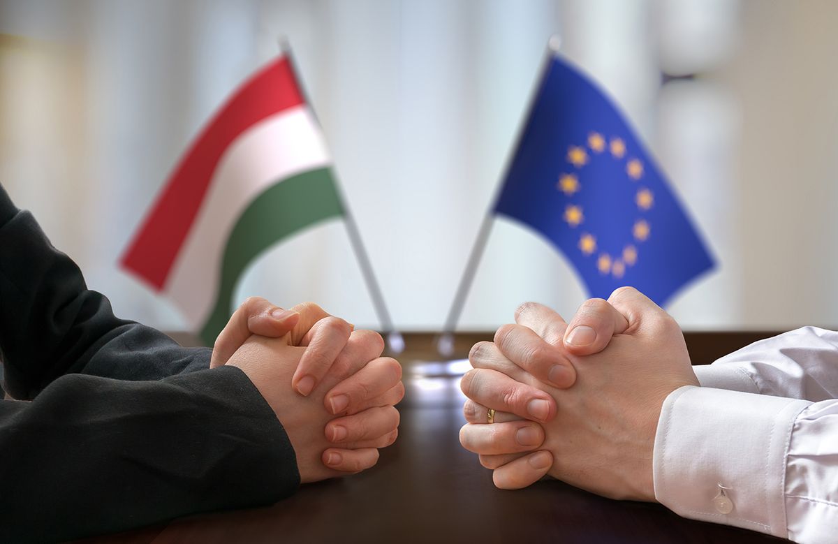 Negotiation,Between,Hungary,And,European,Union.,Hungarian,And,European,Flags