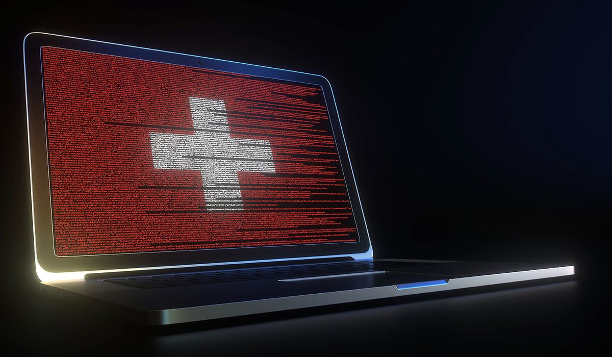 Flag,Of,Switzerland,Made,With,Computer,Code,On,The,Laptop
