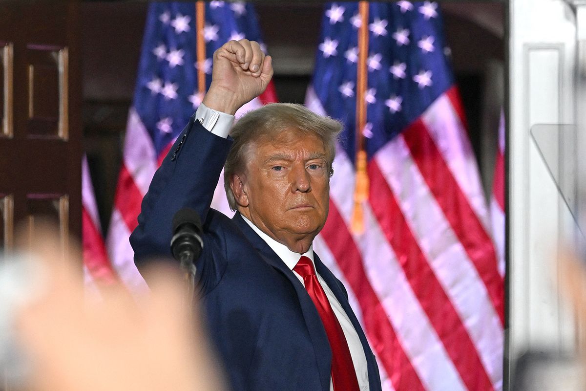 Former US President Donald Trump gestures after delivering remarks at Trump National Golf Club Bedminster in Bedminster, New Jersey, on June 13, 2023. Trump appeared in court in Miami for an arraignment regarding 37 federal charges, including violations of the Espionage Act, making false statements, and conspiracy regarding his mishandling of classified material after leaving office. (Photo by Ed JONES / AFP)