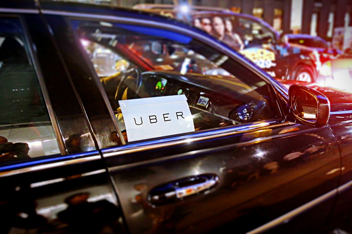 New,York,,Us,-,August,23,,2015.,Uber,Car,Service
New York, US - August 23, 2015.  Uber car service on the streets of New York at Night. With selective focus on Uber logo.