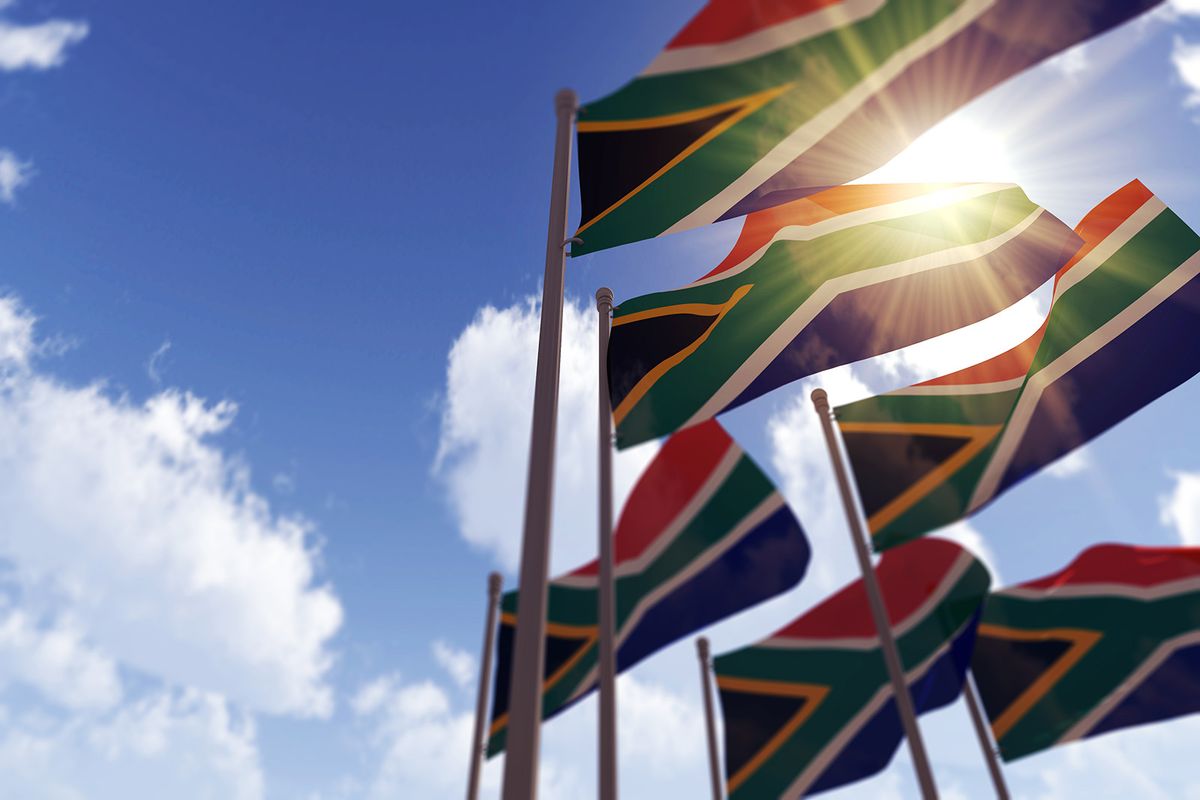 South,Africa,Flags,Waving,In,The,Wind,Against,A,Blue
South Africa flags waving in the wind against a blue sky. 3D Rendering