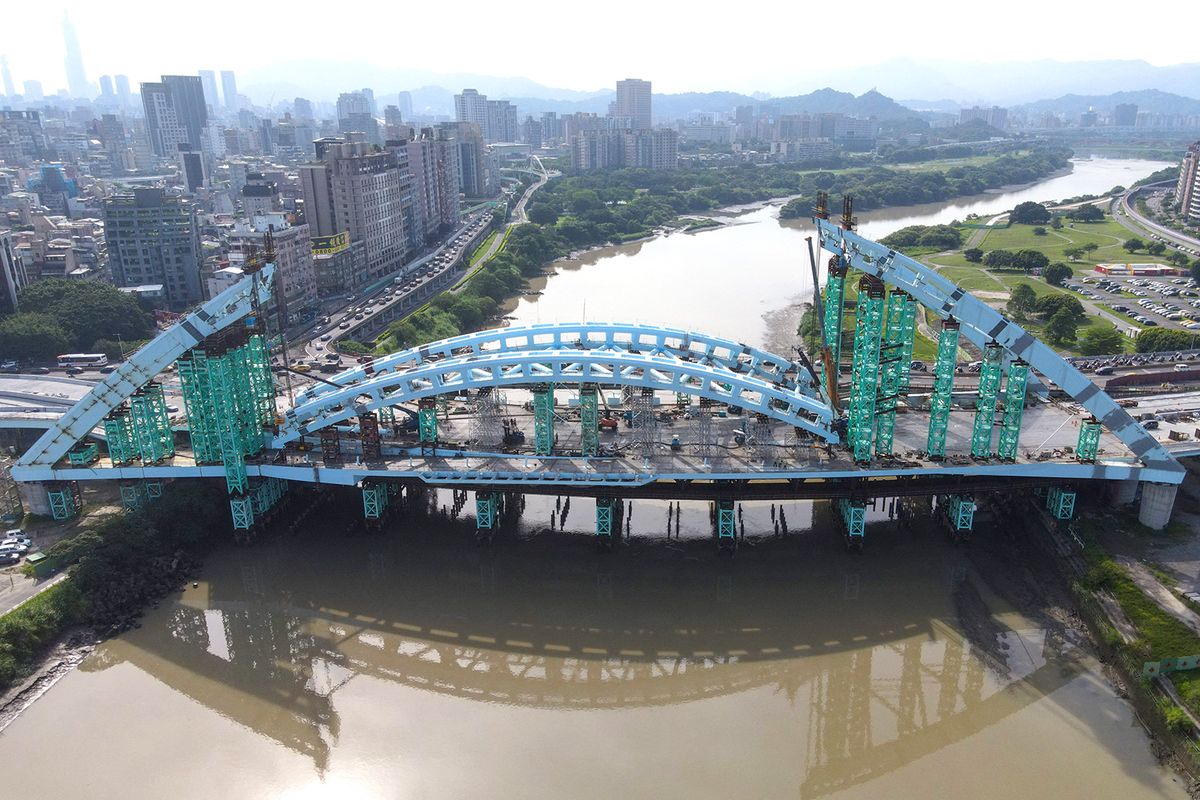 An aerial view shows Zhongzheng bridge under construction in Taipei on June 7, 2023. The bridge crosses the Tamshui river linking Taipei and New Taipei City. AFP Photo
DOCUMENT REFERENCE000_33HB94W
SLUGTAIWAN - ECONOMY
CREATION DATE6/7/2023
CITY/COUNTRYTAIPEI, TAIWAN
CREDITSAM YEH / AFP
FILE SIZE/PIXELS/DPI47.68 Mb / 5000 x 3333 / 300 dpi
TAIWAN-ECONOMY
An aerial view shows Zhongzheng bridge under construction in Taipei on June 7, 2023. The bridge crosses the Tamshui river linking Taipei and New Taipei City.
Sam Yeh / AFP