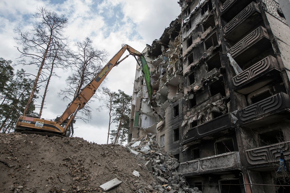 Workers Demolish A Residential Building Heavily Damaged During Russia's Attack In The Town Of Irpin