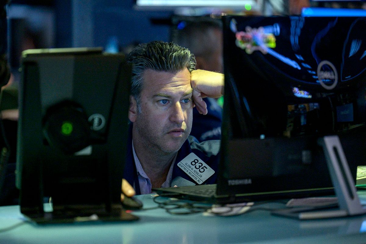 US-STOCKS-MARKETSTraders work the floor at the New York Stock Exchange (NYSE) during the opening bell in New York on May 23, 2023. Stock markets slid on May 23 after fresh talks between President Joe Biden and House Speaker Kevin McCarty on raising the US debt ceiling ended without an agreement as a crucial deadline approaches. (Photo by ANGELA WEISS / AFP)