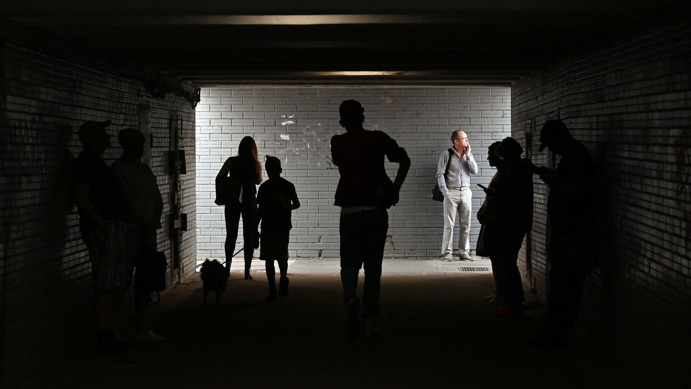 People take shelter in an underground crossing during the Russian attack on the Ukrainian capital of Kyiv, on June 1, 2023. The attack began around 3:00 am local time on June 1, 2023, when cruise and ballistic missiles were fired on the city, killing three people and injuring 12 others, officials said. "In the Desnyanskyi district: three people died, including one child (born in 2012) and 10 people were injured, including one child," the Kyiv City Military Administration wrote on Telegram.