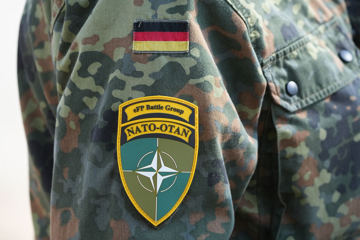 Federal President Steinmeier visits Lithuania
30 May 2023, Lithuania, Pabrade: A patch with the logo "eFP-Battlegroup NATO-OTAN" on the uniform jacket of a German soldier, taken at the Pabrade training area during an exercise of the multinational eFP Battlegroup Lithuania. The eFP (enhanced Forward Presence) aims to strengthen NATO's eastern flank in Estonia, Latvia, Lithuania and Poland by deploying four battalions. Germany provides the commander and currently about 850 soldiers at the Lithuanian military base in Rukla. Photo: Soeren Stache/dpa (Photo by SOEREN STACHE / DPA / dpa Picture-Alliance via AFP)