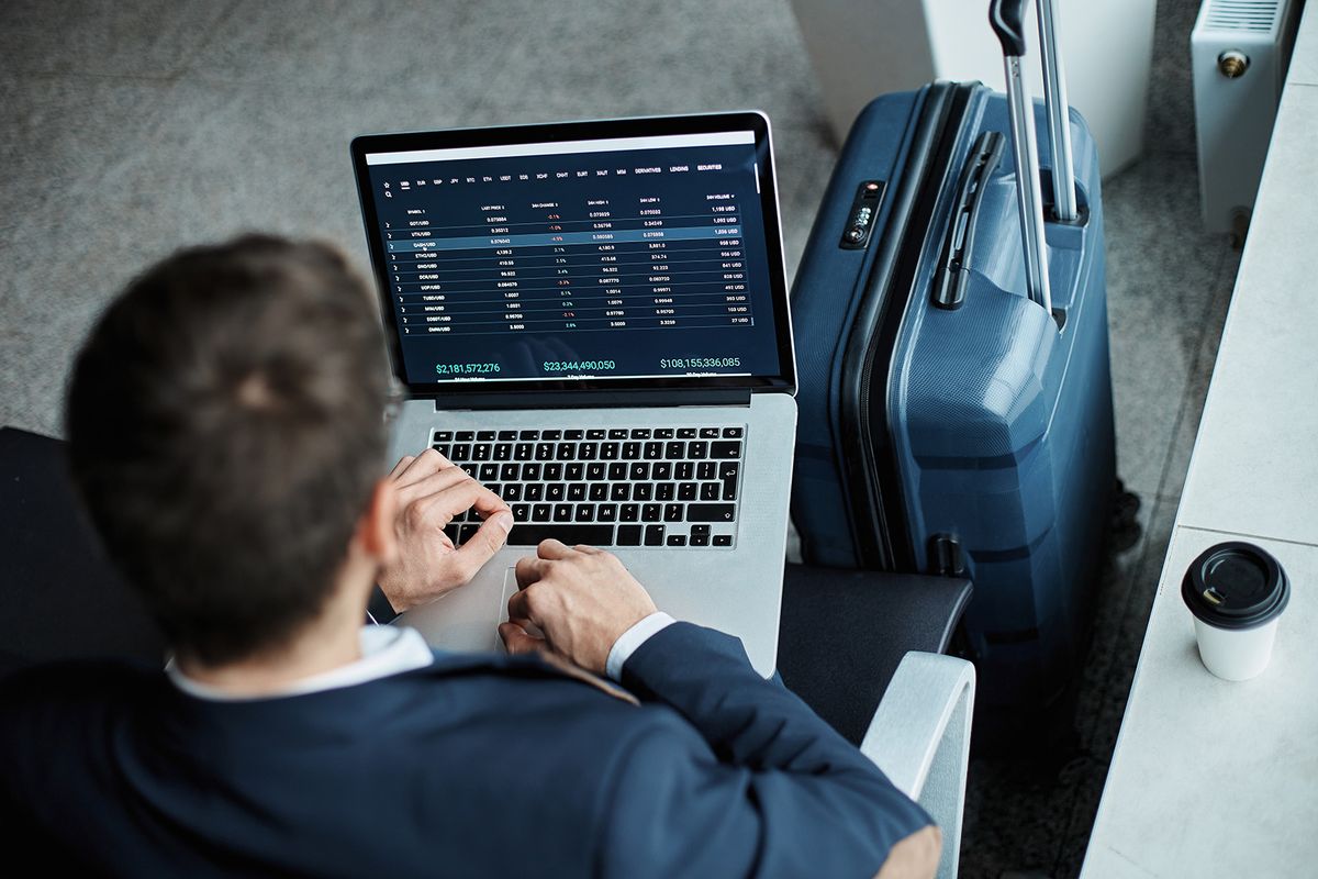 Businessman,Using,A,Laptop,To,Clarify,Data,On,His,Flight.
businessman using a laptop to clarify data on his flight.