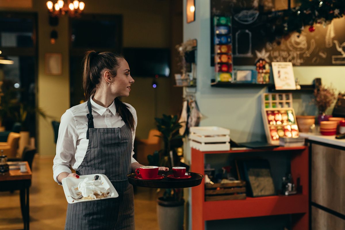 Waitress,Working,In,Cafe,Or,Restaurant,
waitress working in cafe or restaurant
