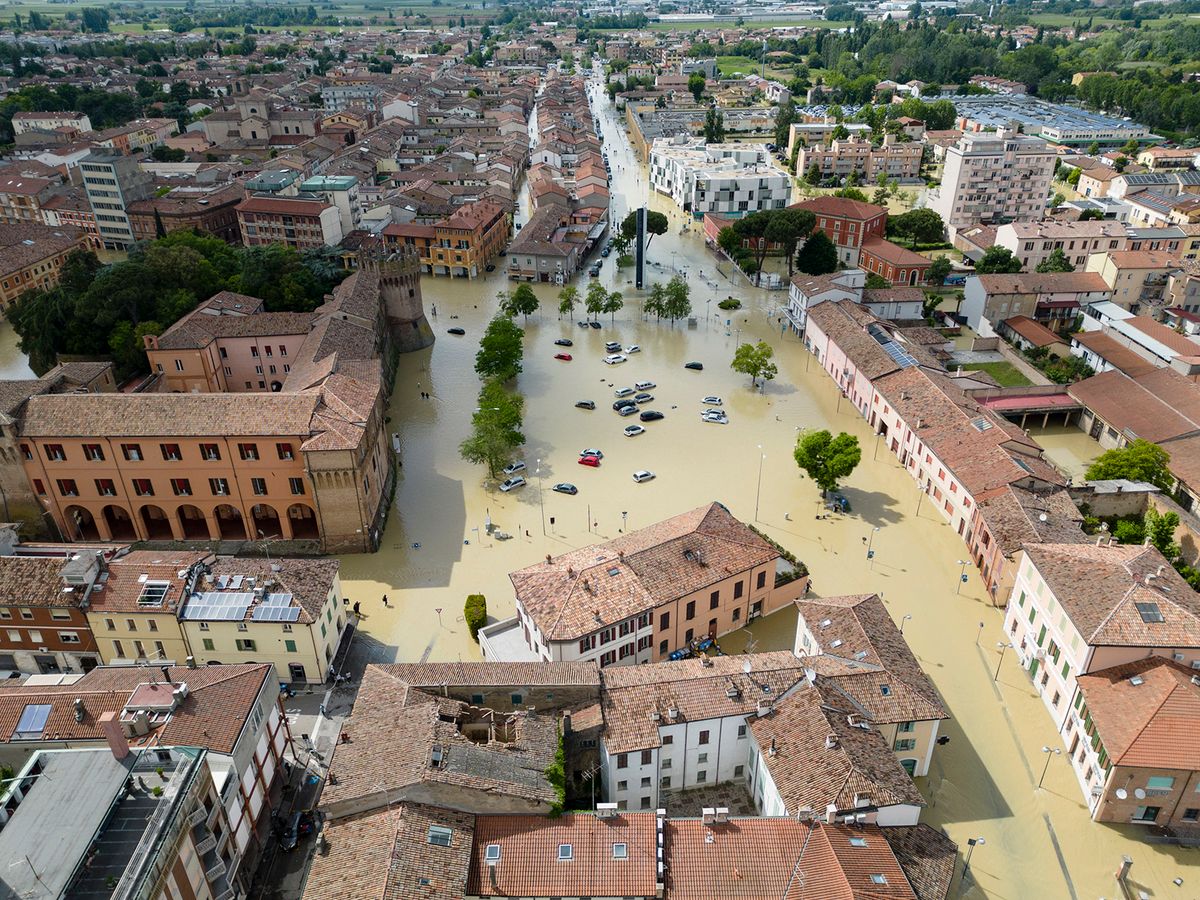 Heavy floods hit drought-struck Emilia-Romagna, Italy
epa10636700 An aerial view shows partially submerged cars and buildings at a flooded area following the overflowing of a river, in the center of Lugo, near Ravenna, Italy, 18 May 2023. Parts of Lugo were under a meter of water in the morning of 18 May following the overflowing of the Senio and Santerno rivers amid heavy rains. Heavy rains have been battering the northern Italian region of Emilia-Romagna following months of severe drought.  EPA/EMANUELE VALERI epa10636700 An aerial view shows partially submerged cars and buildings at a flooded area following the overflowing of a river, in the center of Lugo, near Ravenna, Italy, 18 May 2023. Parts of Lugo were under a meter of water in the morning of 18 May following the overflowing of the Senio and Santerno rivers amid heavy rains. Heavy rains have been battering the northern Italian region of Emilia-Romagna following months of severe drought.  EPA/EMANUELE VALERI