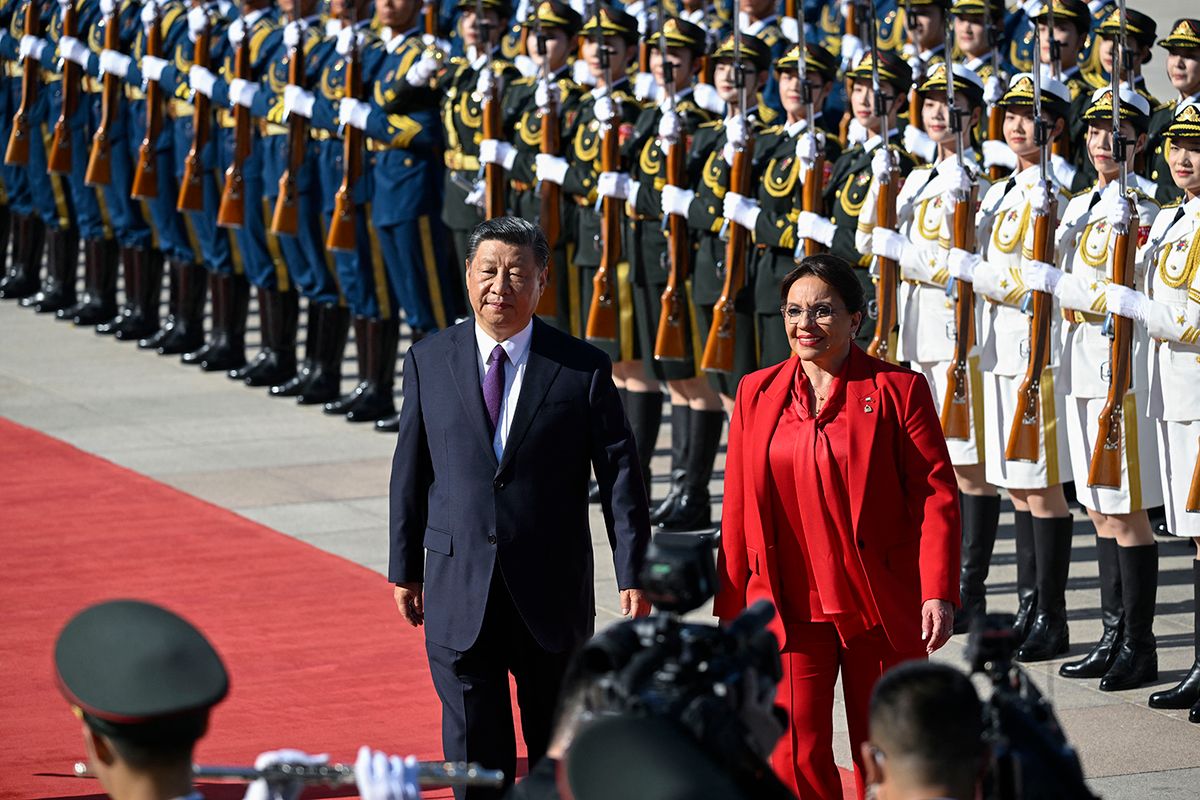 Honduran President Xiomara Castro (L) chats with China's President Xi Jinping (C) during a welcome ceremony outside the Great Hall of the People in Beijing on June 12, 2023. (Photo by WANG Zhao / POOL / AFP)