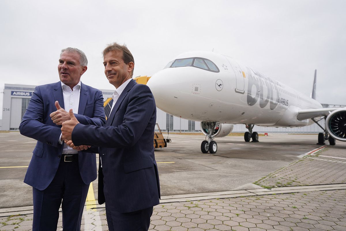 Airbus hands over 600th aircraft to Lufthansa
24 May 2023, Hamburg: Carsten Spohr (l), Chairman of the Executive Board and CEO of Deutsche Lufthansa AG, and Guillaume Faury, Chairman of the Executive Board and CEO of Airbus SE, stand in front of the Airbus A321neo "Münster" after it was handed over to Lufthansa at the Airbus site in Finkenwerder. The A321neo is the 600th Airbus in Lufthansa's fleet. Photo: Marcus Brandt/dpa (Photo by MARCUS BRANDT / DPA / dpa Picture-Alliance via AFP)