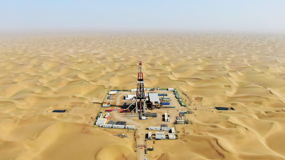 AKSU, CHINA - MARCH 09: Aerial view of an oil well of Tarim Oilfield at Taklimakan Desert in Shaya County on March 9, 2023 in Aksu Prefecture, Xinjiang Uygur Autonomous Region of China. An oil well at Tarim Oilfield was drilled to 9396 meters on March 9, breaking the record of the deepest horizontal oil well in Asia. 