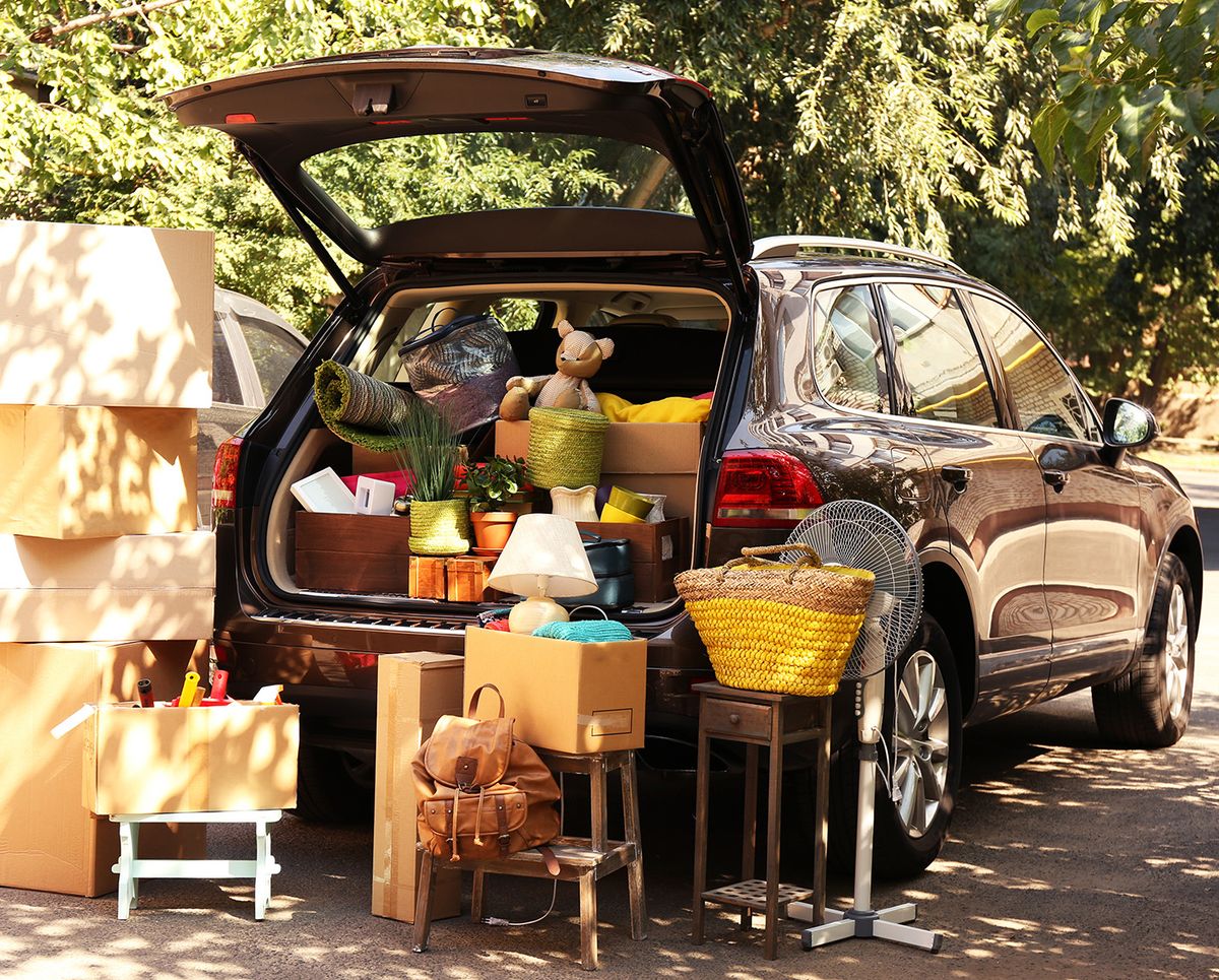 Moving,Boxes,And,Suitcases,In,Trunk,Of,Car,,Outdoors