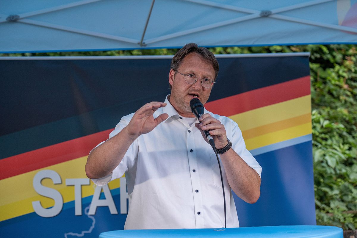 GERMANY-POLITICS-AFD-FARRIGHTRobert Sesselmann of the far-right Alternative for Germany (AfD) party speaks at an election event in Sonneberg, eastern Germany on June 25, 2023. Germany's far-right AfD won its first district election on June 25, 2023, in a further boost to the anti-immigration party as it surges to record-highs in opinion polls. Robert Sesselmann, a lawyer and regional lawmaker, won a closely-watched run-off vote for district administrator in Sonneberg in the central state of Thuringia, near the border with Bavaria. (Photo by FERDINAND MERZBACH / NEWS5 / AFP)