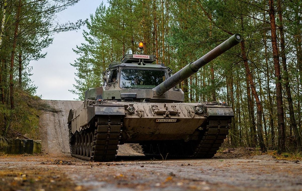 Tank driving training of Slovak servicemen and women
24 November 2022, Lower Saxony, Munster: A Slovakian soldier drives a Bundeswehr Leopard II driving training tank, through the terrain during driving training. The Bundeswehr is currently training Slovakian soldiers on the Leopard 2 A4 main battle tank in Munster. The background to this is a ring exchange of 15 Leopard tanks to Slovakia commissioned by the German government, as the Bundeswehr announced on Thursday. Photo: Philipp Schulze/dpa (Photo by PHILIPP SCHULZE / DPA / dpa Picture-Alliance via AFP)