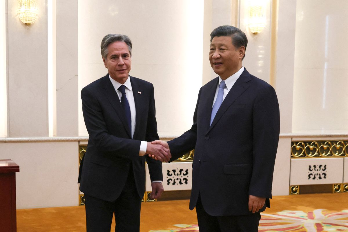 US Secretary of State Antony Blinken (L) shakes hands with China's President Xi Jinping at the Great Hall of the People in Beijing on June 19, 2023. President Xi Jinping hosted Antony Blinken for talks in Beijing on June 19, capping two days of high-level talks by the US secretary of state with Chinese officials. (Photo by Leah MILLIS / POOL / AFP)