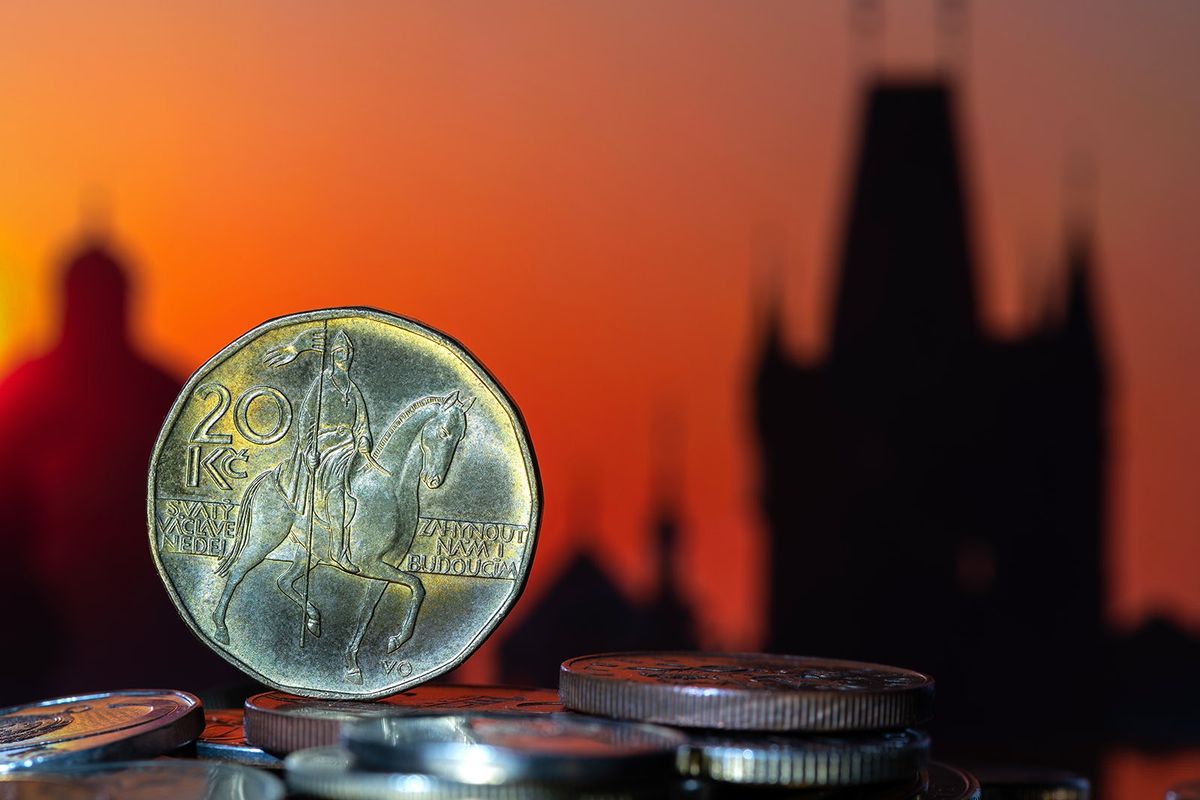A,20,Czk,Coin,And,Other,Coins,Against,The,Background
A 20 CZK coin and other coins against the background of out-of-focus fragments of Prague buildings