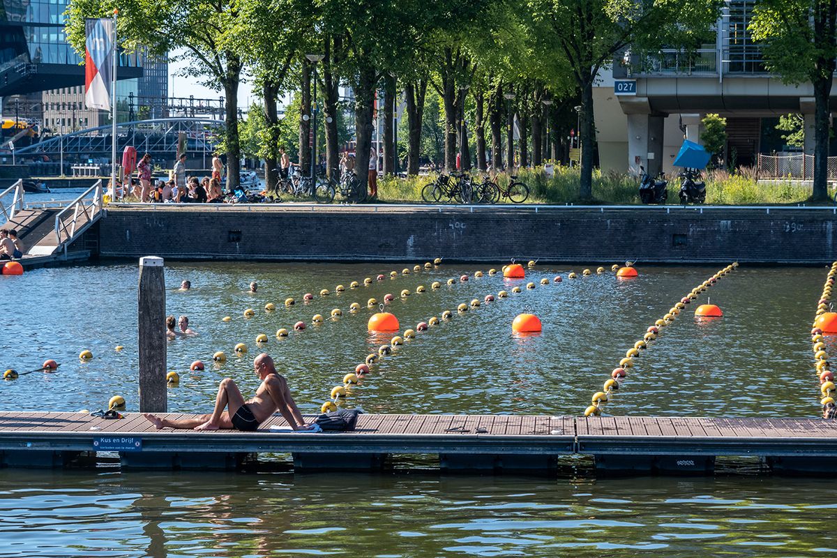 Amsterdam,,The,Netherlands,-,22,June,2022:,People,Bathing,At