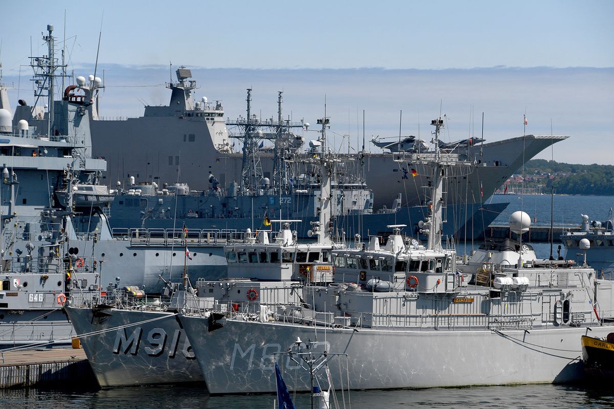 Nato Baltic Manoeuvre "Baltops"
07 June 2019, Schleswig-Holstein, Kiel: Naval vessels (in the background the Spanish aircraft carrier "Juan Carlos I.") lie in the naval port for the start of the manoeuvre Baltic Operations (BALTOPS). Warships from 18 nations take part in the manoeuvre on the Baltic Sea starting on 08.06.2019. Photo: Carsten Rehder/dpa (Photo by CARSTEN REHDER / DPA / dpa Picture-Alliance via AFP)