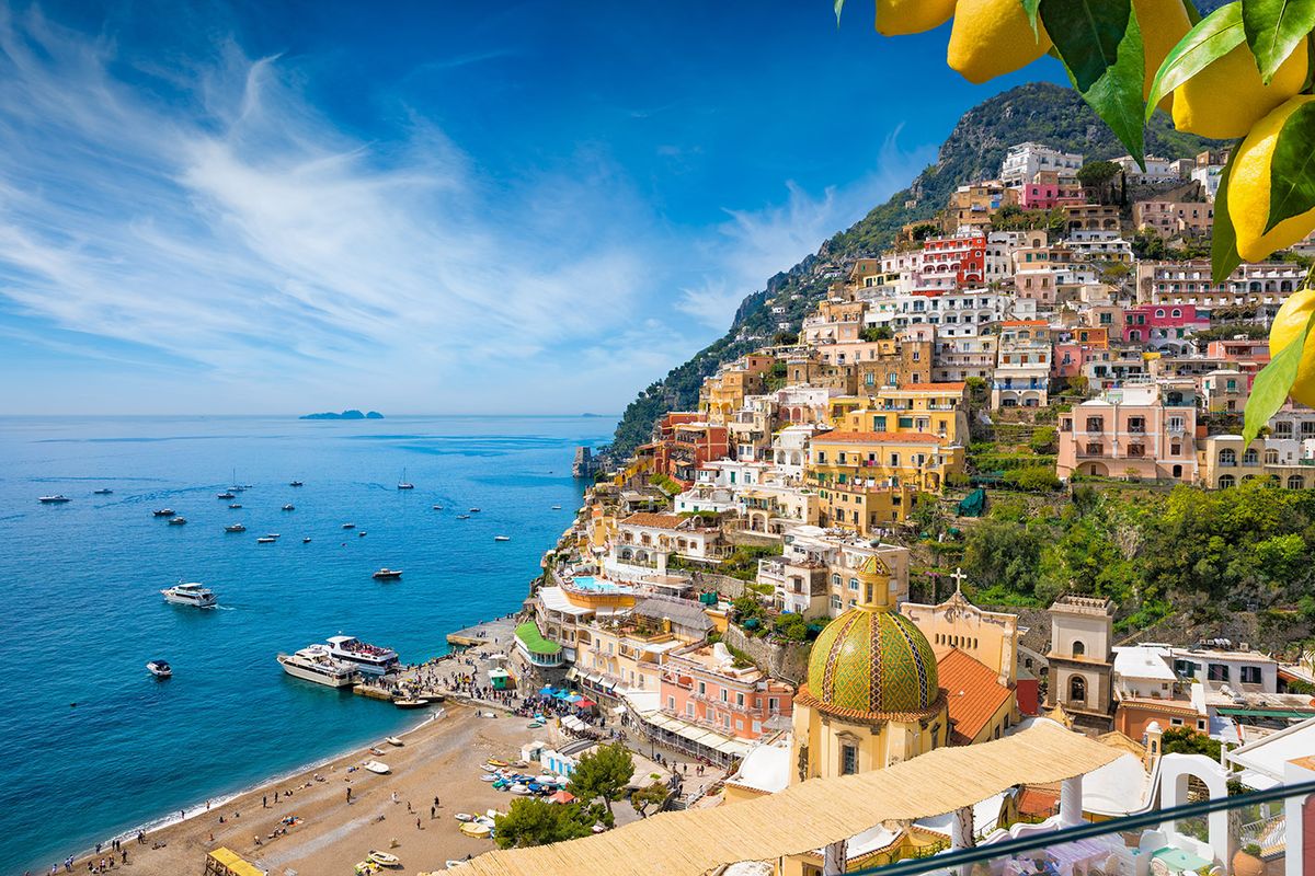Aerial,View,Of,Positano,With,Comfortable,Beach,And,Blue,Sea