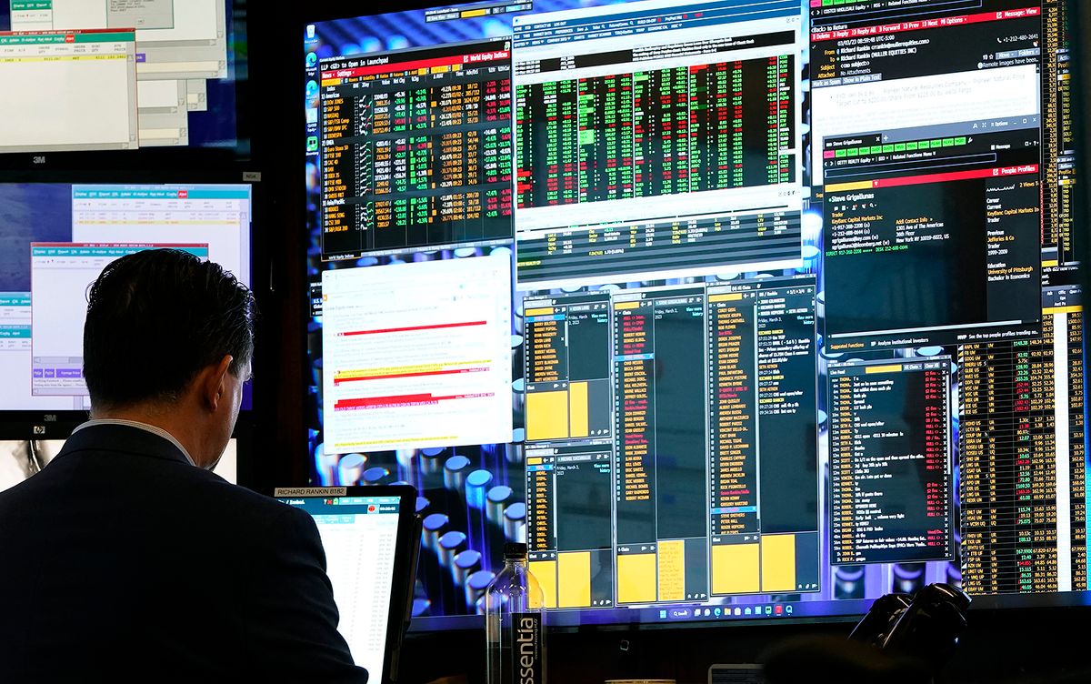 Traders work on the floor of the New York Stock Exchange on March 3, 2023. Wall Street stocks rose early Friday, extending a market upswing despite lingering worries about the likelihood of more central bank interest rate hikes. (Photo by TIMOTHY A. CLARY / AFP)