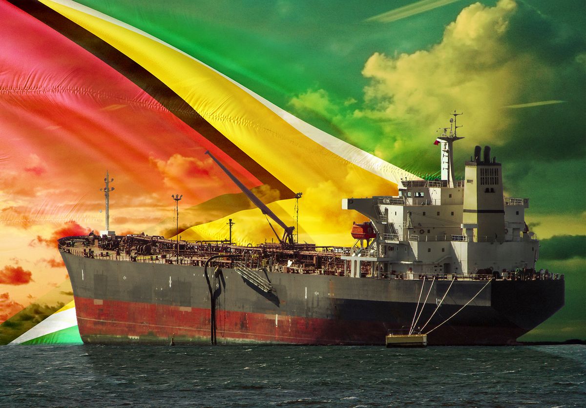 The,Oil,Tanker,On,The,Ocean,With,Guyana,Flag,Background
The oil tanker on the ocean with Guyana flag background