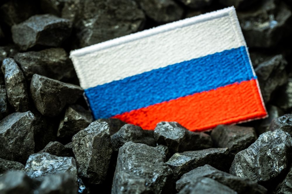 Russian,Flag,On,The,Background,Of,Coal,,Concept,Of,Coal