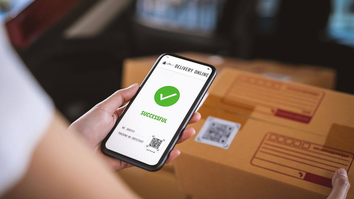 Startup,Small,Business,,Hand,Using,Smartphone,With,Scan,Qr,Code
Startup small business, hand using smartphone with scan QR code on cardboard box delivery for products to send to customers.
