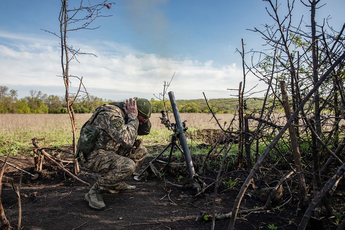 'BATTLE FOR BAKHMUT'20230507_zaa_s197_313.jpgMay 7, 2023, Bakhmut, Donetsk region, Ukraine: A soldier covers his ears as the mortar unit of the Armed Forces of Ukraine fires at enemy positions in the suburbs of Bakhmut, Donetsk region. The intensity of battles in the Bakhmut sector has been compared to those of World Wars I and II. The battle for Bakhmut has been the most intense of the Russia-Ukraine conflict, costing thousands of lives on both sides in months of grinding warfare. Ukrainian troops have been pushed back in recent weeks but have clung on in the city to inflict as many Russian losses as possible ahead of Kyiv's planned big push against the invading forces along the 620-mile front line. Ukraine is expected to soon start a much-anticipated counteroffensive to retake Moscow-held territory, including in the Zaporizhzhia region, which hosts Europe's largest nuclear plant. The United Nations nuclear watchdog expressed concern over the possible escalation of hostilities. Welcome to 'BATTLE FOR BAKHMUT'