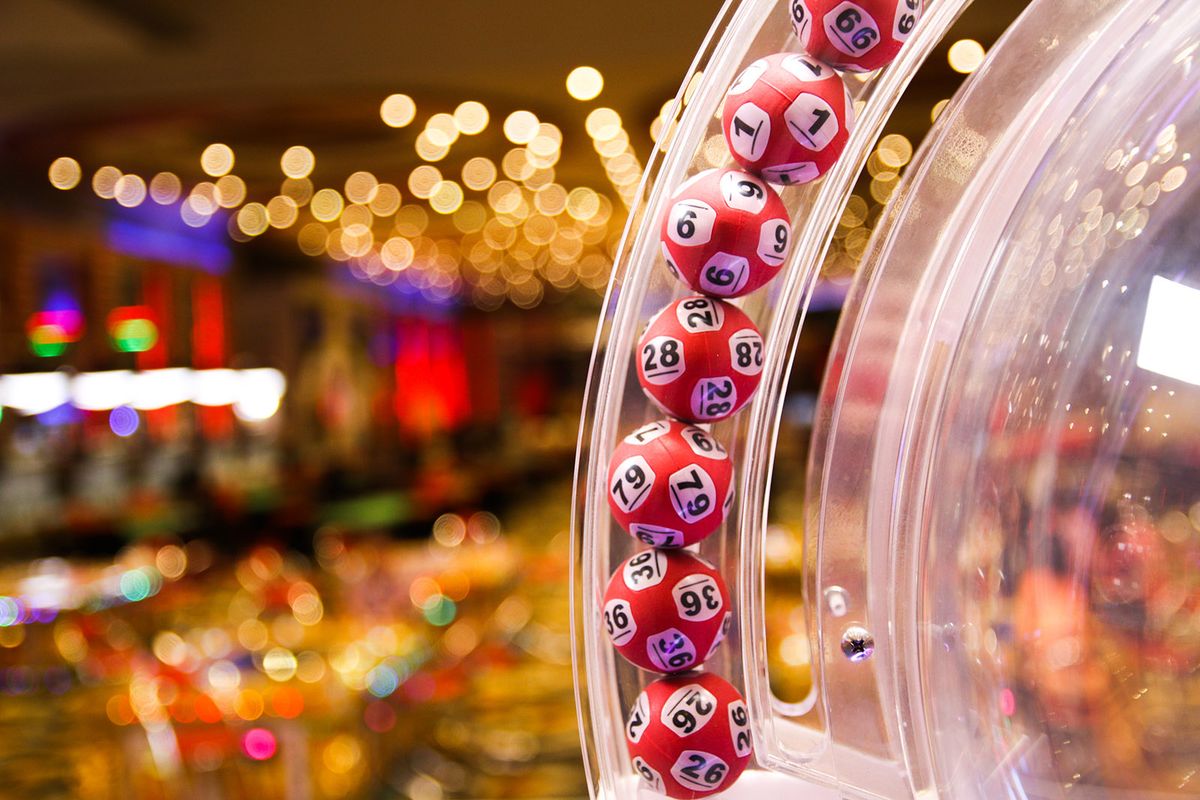 Red,Lottery,Balls,In,A,Bingo,Machine.gambling,Machine,And,Euqipment.
Red lottery balls in a bingo machine.Gambling machine and euqipment.