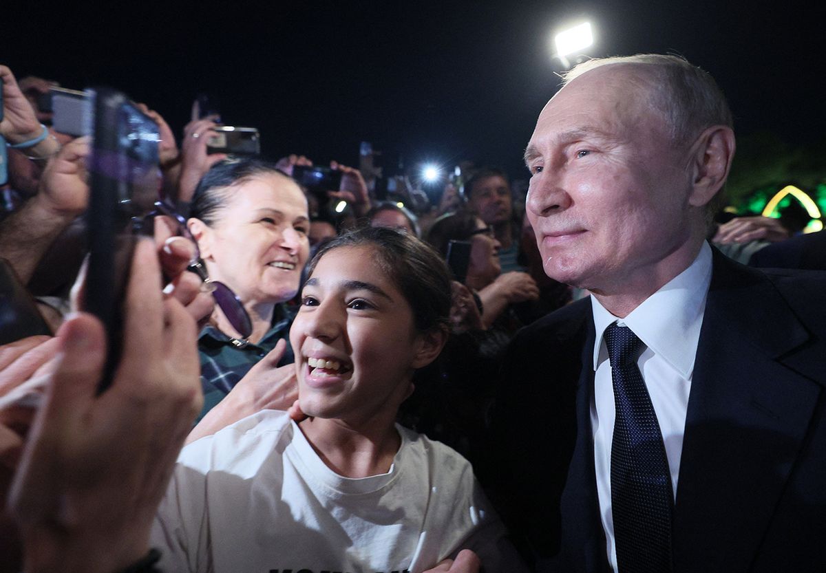 Russian President Vladimir Putin meets with residents of Derbent during his working trip to Russia's Republic of Dagestan on June 28, 2023. (Photo by Gavriil GRIGOROV / SPUTNIK / AFP)