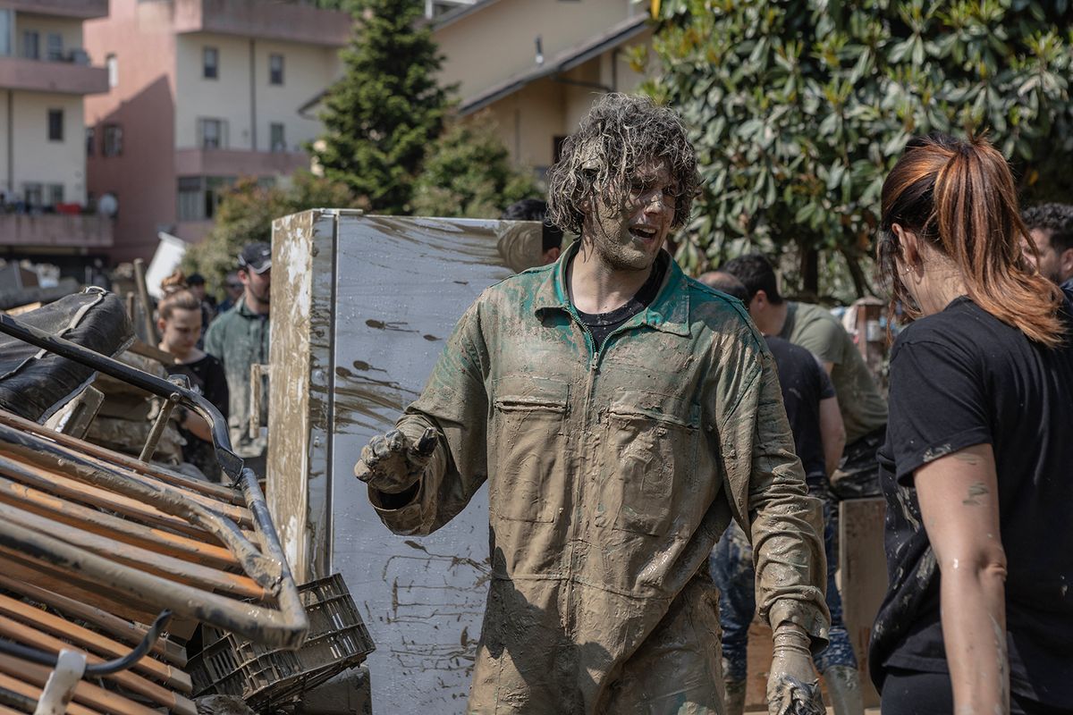 Floods hit Northern Italy
FORLI, ITALY – MAY 21: Volunteers help residents to clear streets and houses by shoveling mud in neighborhoods that have been submerged by water and mud in Forli, Emilia Romagna, Italy on May 21, 2023. Andrea Carrubba / Anadolu Agency (Photo by Andrea Carrubba / ANADOLU AGENCY / Anadolu Agency via AFP)