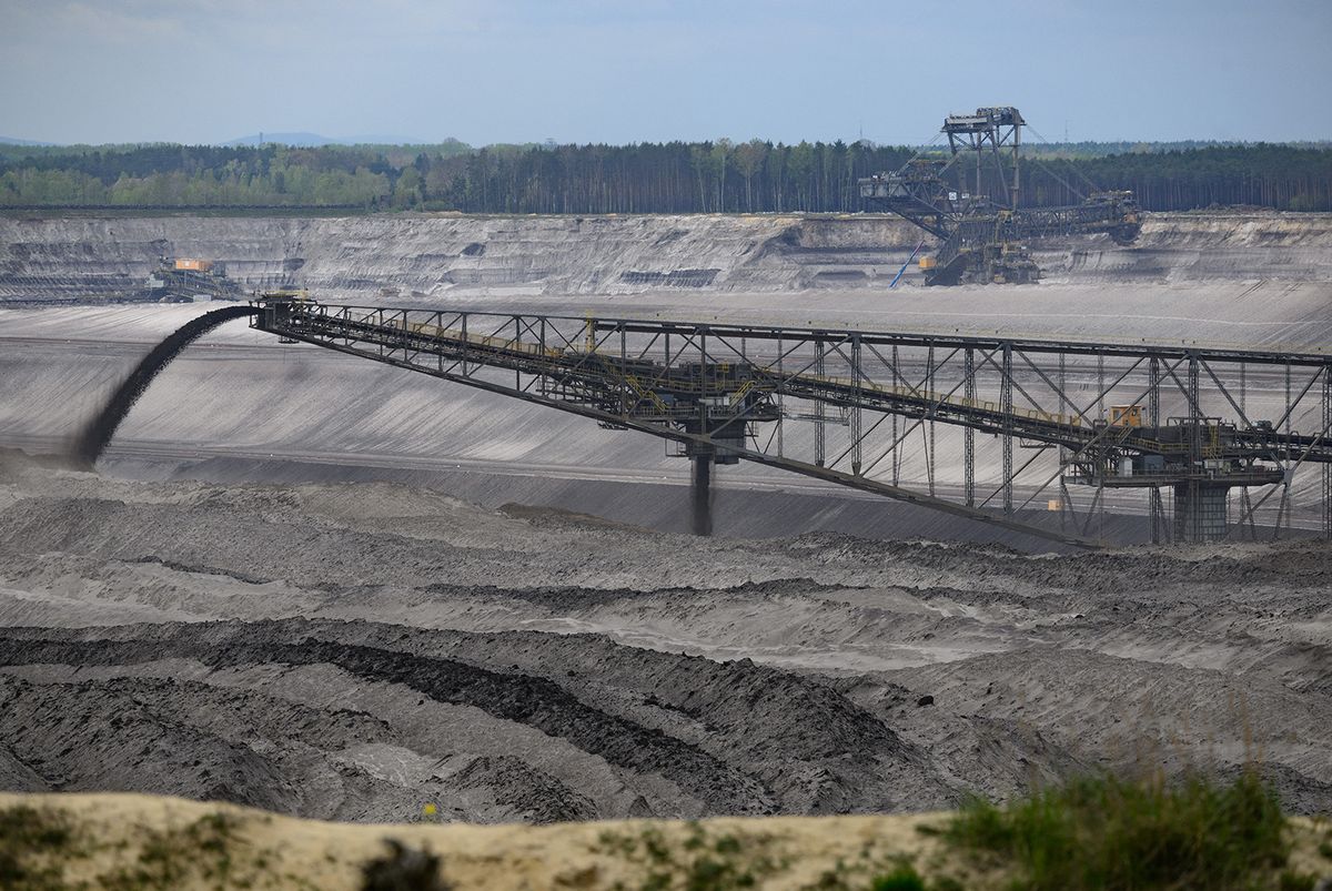 Mühlrose in Saxony to make way for coal
PRODUCTION - 25 April 2023, Saxony, Weißwasser: The F60 overburden conveyor bridge transports overburden to the dump in the Nochten open pit mine; the precut excavator is in the background. Despite the agreement to phase out coal by 2038, Mühlrose is to be one of the last villages to make way for open pit mining because the lignite lying beneath the village is to be extracted by the Nochten open pit mine from the end of the 2020s. Photo: Robert Michael/dpa (Photo by ROBERT MICHAEL / DPA / dpa Picture-Alliance via AFP)