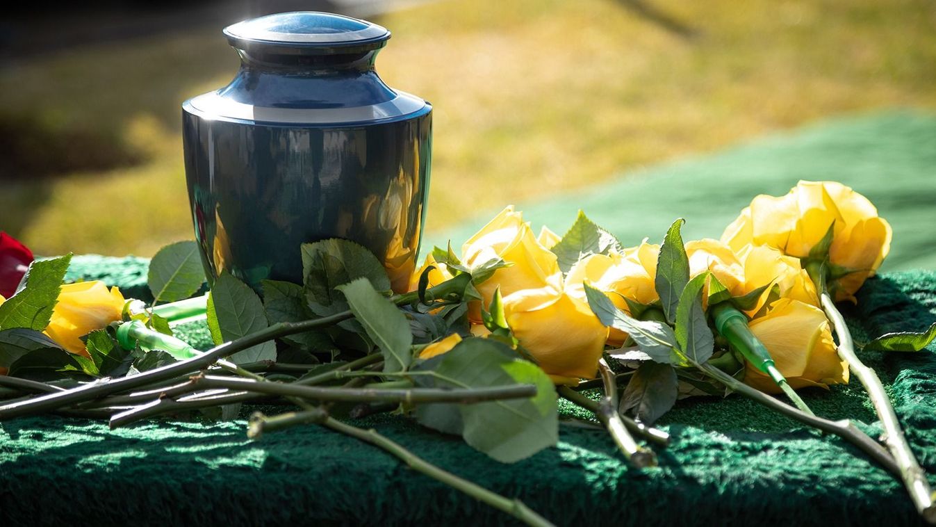 Ceramic,Burial,Urn,With,Yellow,Roses,,In,A,Morning,Funeral
Ceramic burial urn with yellow roses, in a morning funeral scene, with space for text on the right