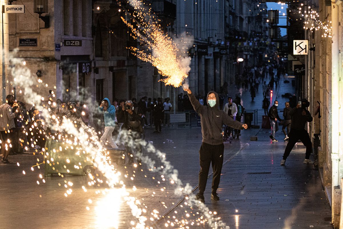 Riots in Bordeaux in reaction to Nahel s death
Bordeaux, Gironde, Nouvelle Aquitaine, 30/06/2023. A masked person is using fireworks in the direction of the police.Bordeaux, Gironde, Nouvelle Aquitaine, le 30/06/2023. Une personne masquee est en train d utiliser un feu d artifice en direction de la police. (Photo by Stephane DUPRAT / Hans Lucas / Hans Lucas via AFP)