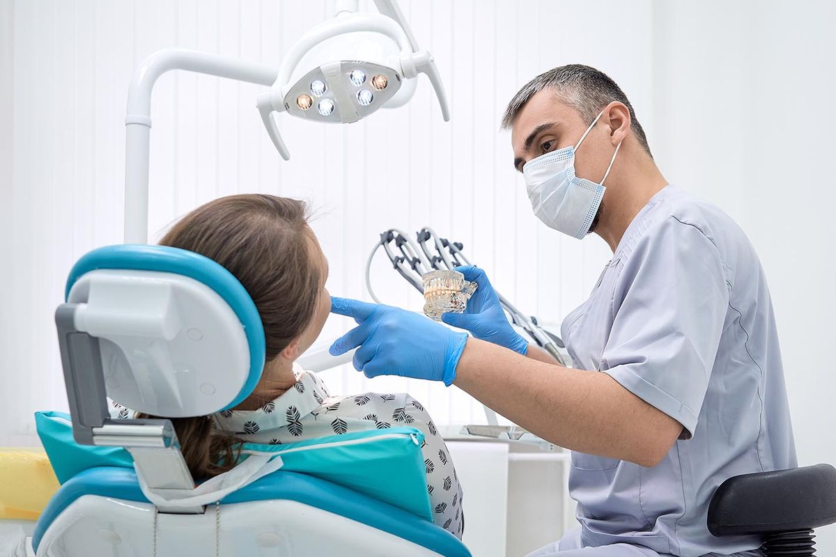 An,Orthodontist,Conducts,A,Consultation,On,Dental,Prosthetics.,Doctor,Dentist