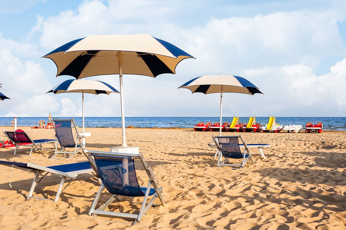 Umbrella,Beach,For,Relaxing,And,Sun,Set,Beach.,Bibione,,Italy