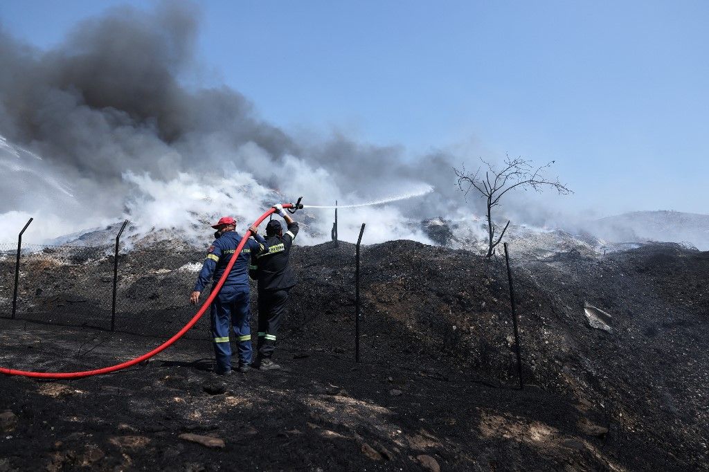 Wildfire spreading to ammunition depot causes explosion in Greece