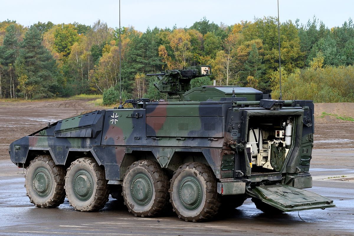 GERMANY-DEFENCE-EXERCISEA "Boxer"  multirole armoured fighting vehicle of the German armed forces Bundeswehr drives through the mud during the informative educational practice "Land Operation Exercise 2017" at the military training area in Munster, northern Germany, on October 13, 2017. (Photo by PATRIK STOLLARZ / AFP)