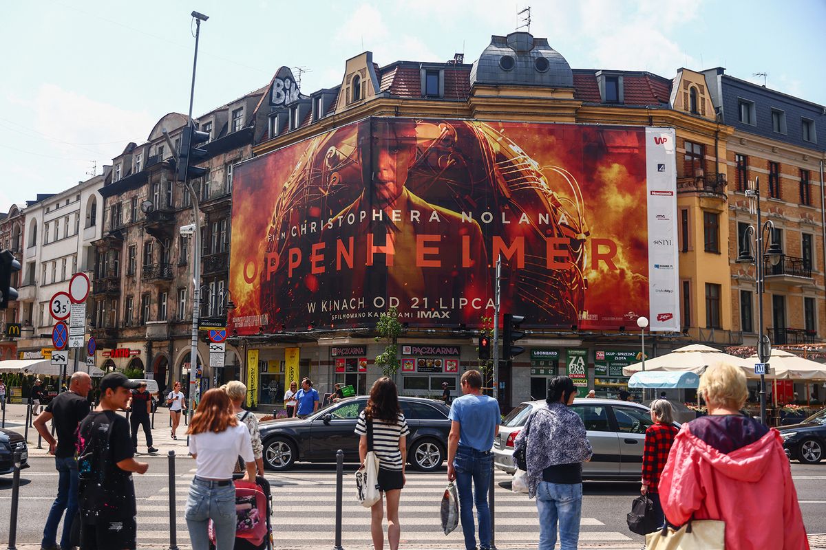 Economy And Business In Poland
Christopher Nolan's 'Oppenheimer' movie billboard is seen in Katowice, Poland on July 20, 2023. (Photo by Beata Zawrzel/NurPhoto) (Photo by Beata Zawrzel / NurPhoto / NurPhoto via AFP)