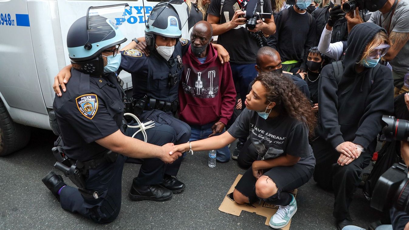A girl after negotiating for long minutes convinced two NYPD officers to kneel along with the other protesters in support of the fight against racism and George Floyd's memory