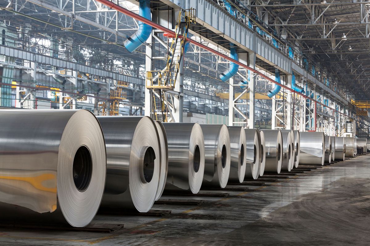 Row,Of,Rolls,Of,Aluminum,Lie,In,Production,Shop,OfRow of rolls of aluminum lie in production shop of plant.