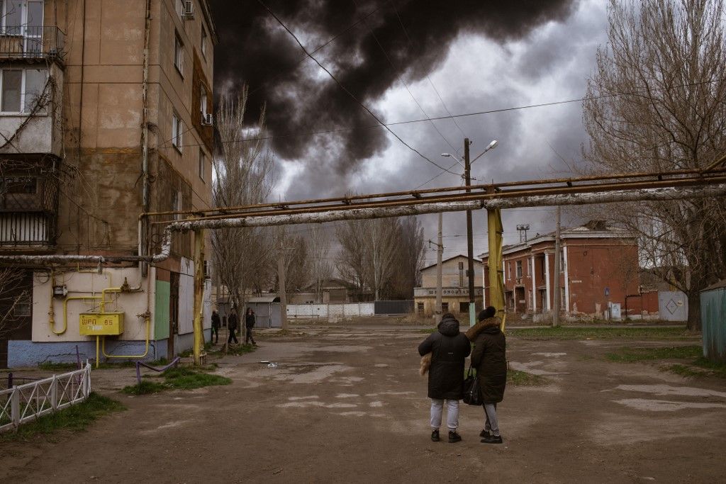 Evacuation from Mariupol
ODESSA, UKRAINE - APRIL 02: A view from the burning building after the attack in Odessa, Ukraine on April 02, 2022. Fire broke out due to an explosion caused by Russian rockets in the Port of Odessa. The explosions took place around 7 am but the fires in fuel tanks have not yet been circumscribed. Andre Luis Alves / Anadolu Agency (Photo by Andre Luis Alves / ANADOLU AGENCY / Anadolu Agency via AFP)