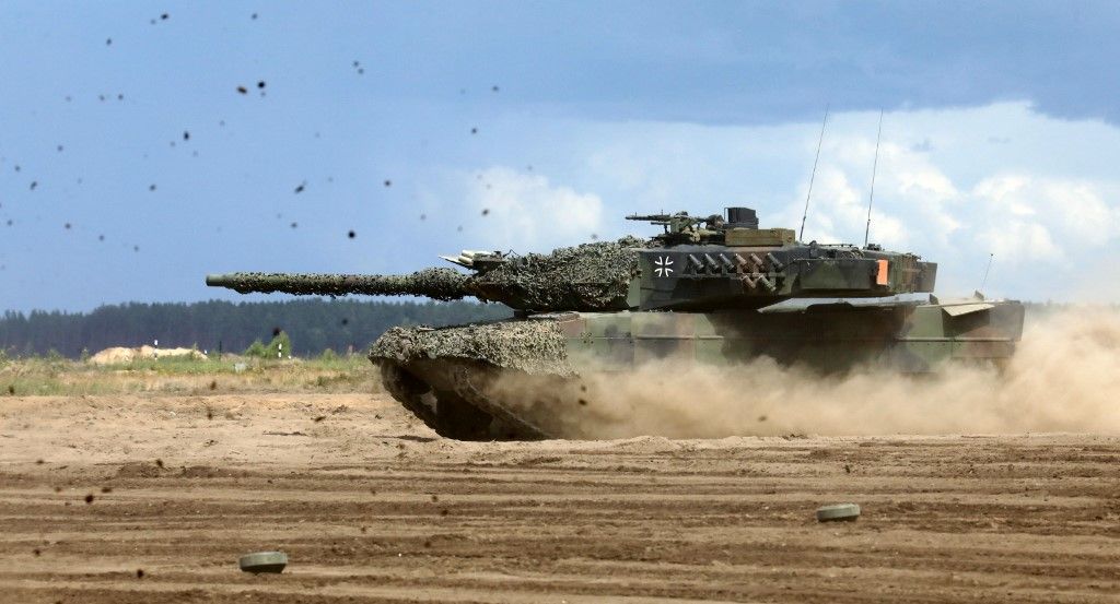 A Germany army main battle tank Leopard 2A6 takes part in the bilateral Lithuanian-German military exercise 'Griffin Storm' at the General Silvestras Zukauskas Training Area in Pabrade, Lithuania on June 26, 2023. Germany on June 26, 2023 said it was prepared to station 4,000 troops in Lithuania after the Baltic nation called on NATO to strengthen its eastern flank. "Germany is ready to permanently station a robust brigade in Lithuania," Defence Minister Pistorius said on a visit to Vilnius. (Photo by PETRAS MALUKAS / AFP)