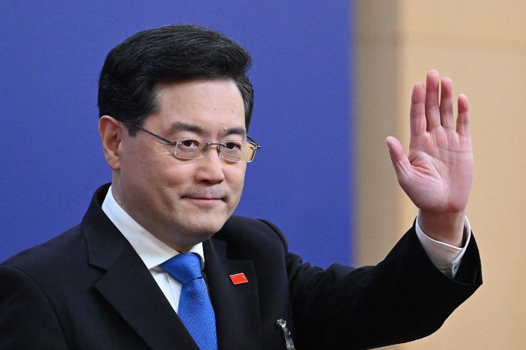 (FILES) China's Foreign Minister Qin Gang waves as he arrives for a press conference at the Media Center of the National People's Congress (NPC) in Beijing on March 7, 2023. China's foreign minister Qin Gang was removed from office on July 25, 2023, state media reported, after not being seen in the public eye for a month. (Photo by NOEL CELIS / AFP)