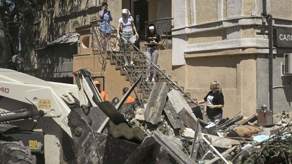 Russian missile strikes on Odesa damage historic buildingsODESSA, UKRAINE - JULY 25: People stand near damaged building after Russian missile attacks in Odessa, Ukraine on July 25, 2023. Multiple missile strikes on the city of Odessa, classified as a UNESCO World Heritage Site, caused damage to at least 20 historic buildings including Odessa cathedral. Ercin Erturk / Anadolu Agency (Photo by Ercin Erturk / ANADOLU AGENCY / Anadolu Agency via AFP)