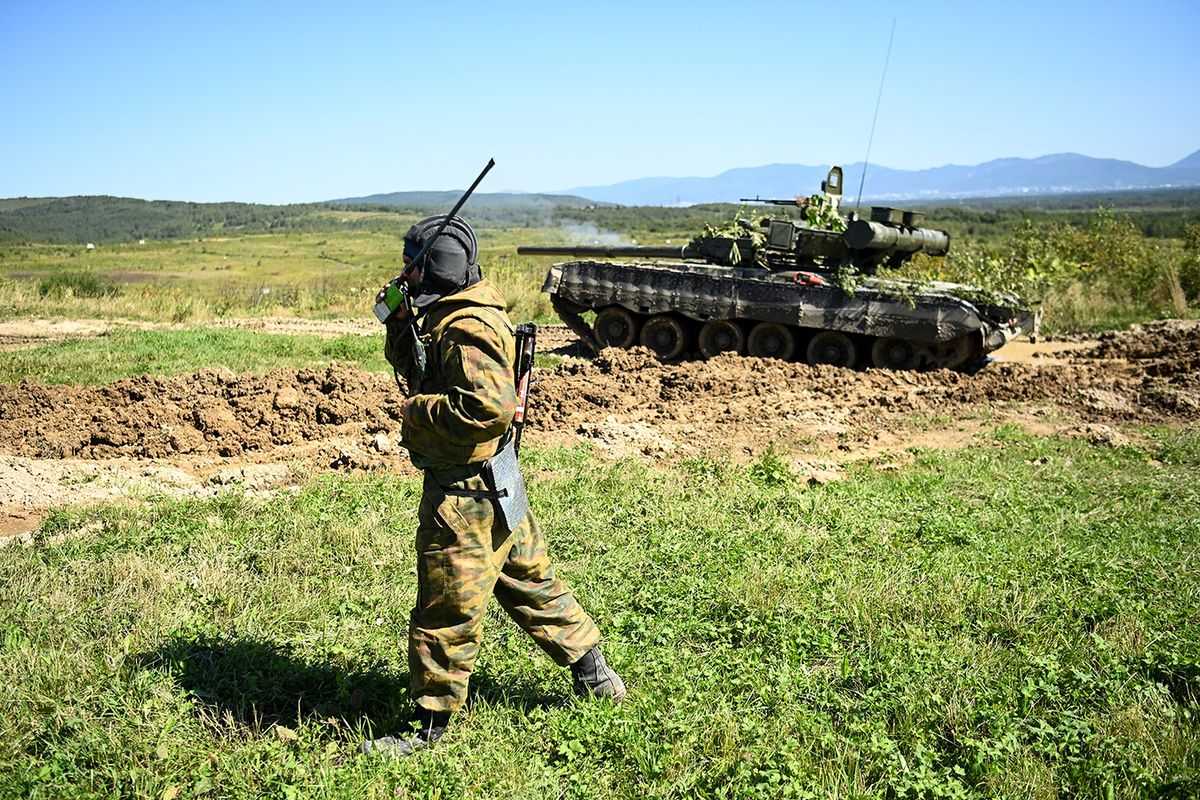 A Russian serviceman takes part in the 'Vostok-2022' military exercises at the Uspenovskyi training ground (Sakhalin Island) outside the city of Yuzhno-Sakhalinsk on the Russian Far East on September 4, 2022. The Vostok 2022 military exercises, involving several Kremlin-friendly countries including China, takes place from September 1-7 across several training grounds in Russia's Far East and in the waters off it. Over 50,000 soldiers and more than 5,000 units of military equipment, including 140 aircraft and 60 ships, are involved in the drills. (Photo by Kirill KUDRYAVTSEV / AFP)